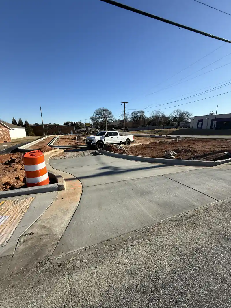 Commercial concrete paving and kerb work in progress.