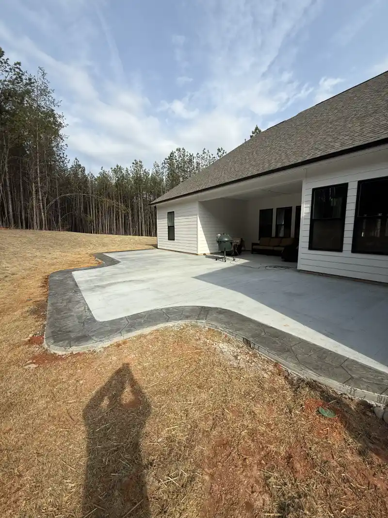 Concrete patio and outdoor living area poured by Ace Concrete Construction