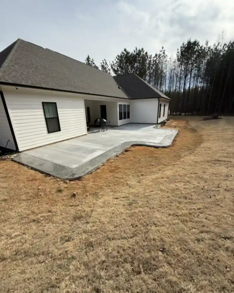 A concrete patio and outdoor living area poured by Ace Concrete Construction