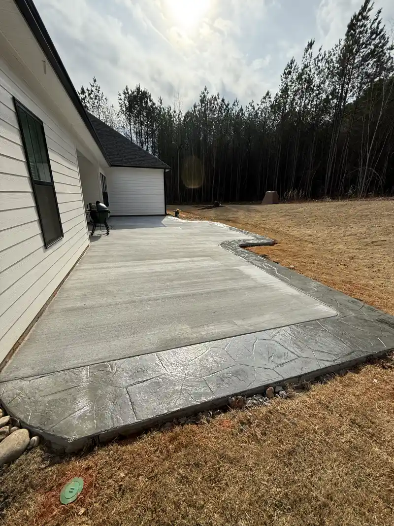 Concrete patio and outdoor living area poured by Ace Concrete Construction