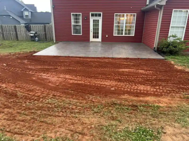 A concrete patio and outdoor living area poured by Ace Concrete Construction