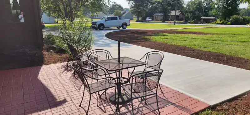 Concrete patio and outdoor living area poured by Ace Concrete Construction