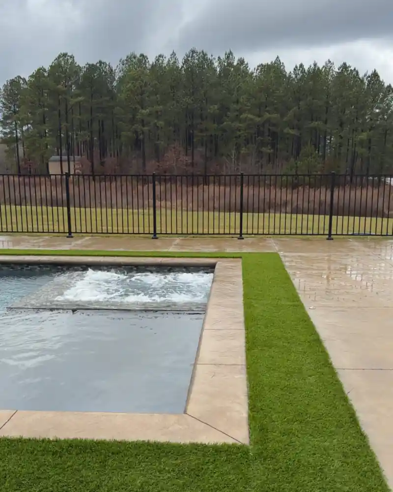 A concrete patio and outdoor living area poured by Ace Concrete Construction