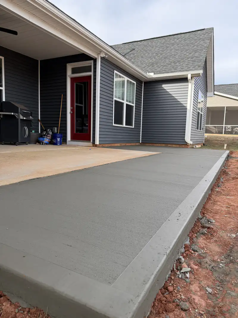 Concrete patio and outdoor living area poured by Ace Concrete Construction
