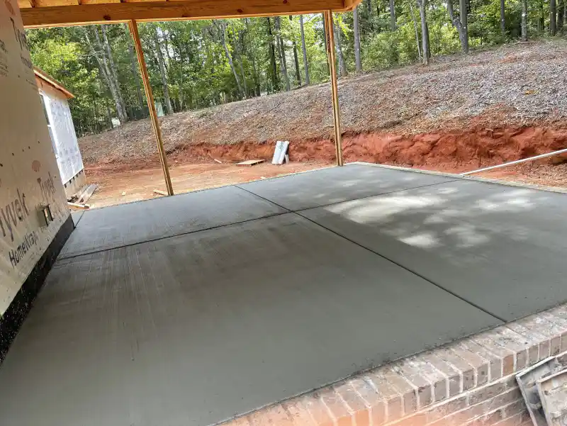 Concrete patio and outdoor living area poured by Ace Concrete Construction