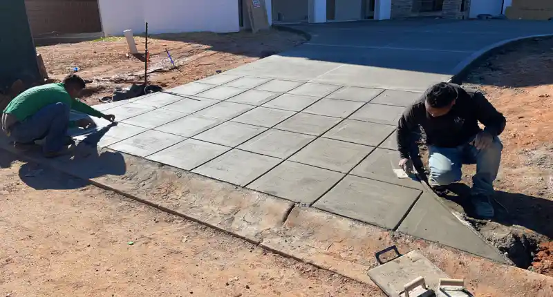 Concrete patio and outdoor living area poured by Ace Concrete Construction