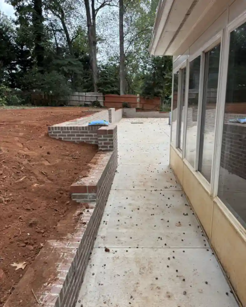 A concrete patio and outdoor living area poured by Ace Concrete Construction