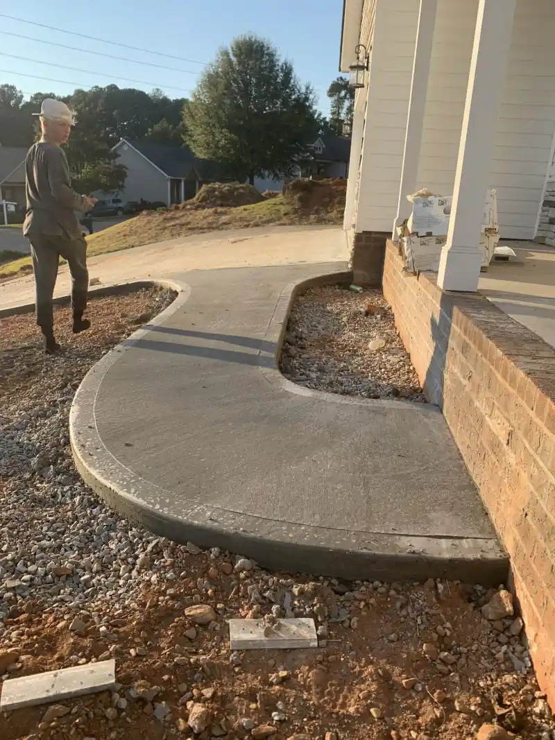 Concrete patio and outdoor living area poured by Ace Concrete Construction